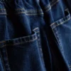 Jeans i bomuldsdenim med høj talje og konisk snit