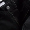 Jeans i bomuldsdenim med udvidede ben og mellemhøj talje