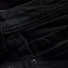 Jeans i bomuldsdenim med udvidede ben og mellemhøj talje