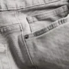 Jeans med mellemhøj talje og lige ben