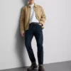 Jeans med mellemhøj talje og slim fit