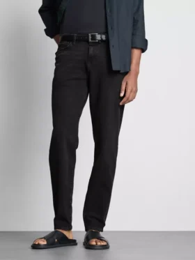 Jeans med mellemhøj talje og slim fit