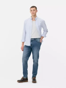 Jeans med mellemhøj talje og slim fit