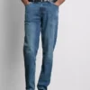 Jeans med mellemhøj talje og slim fit