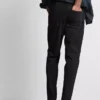 Jeans med mellemhøj talje og slim fit