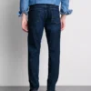 Jeans med mellemhøj talje og slim fit