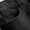 Jeans med mellemhøj talje og slim fit