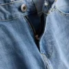 Jeans med mellemhøj talje og slim fit