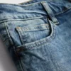 Jeans med mellemhøj talje og slim fit