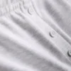 Jersey-shorts med knapdetaljer i bomuldsrigt materiale