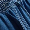 Joggingbukser i bomuldsdenim med konisk ben
