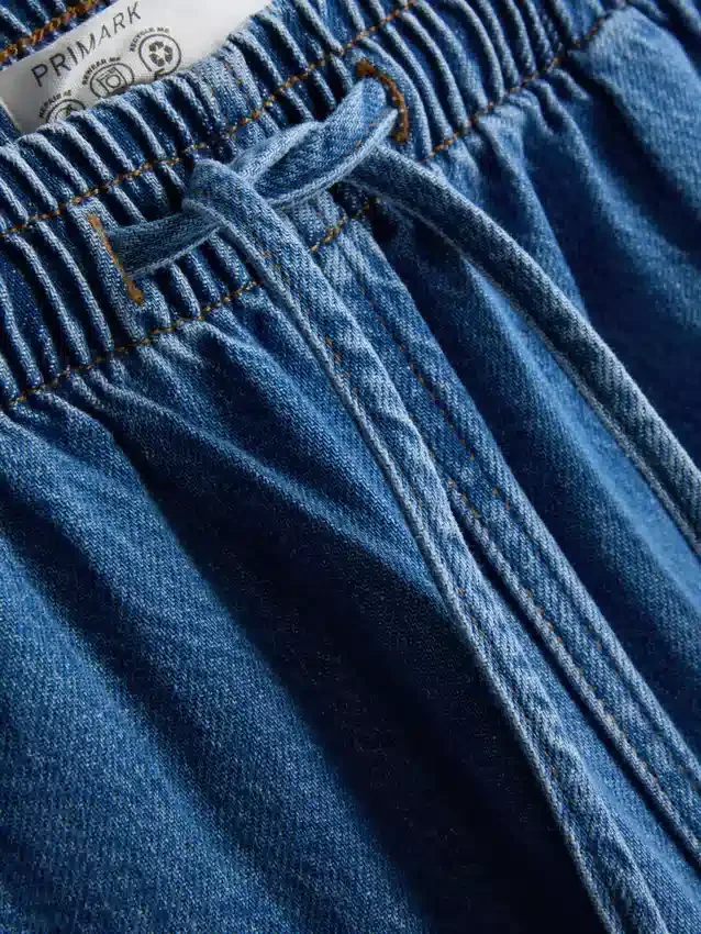 Joggingbukser i bomuldsdenim med konisk ben