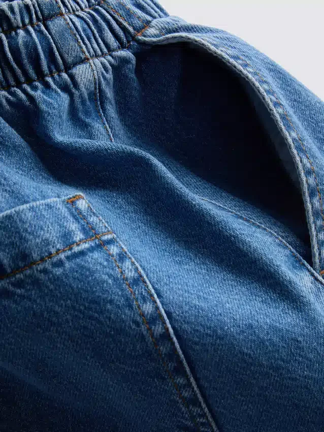 Joggingbukser i bomuldsdenim med konisk ben