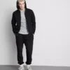 Joggingbukser med elastisk talje og manchetter