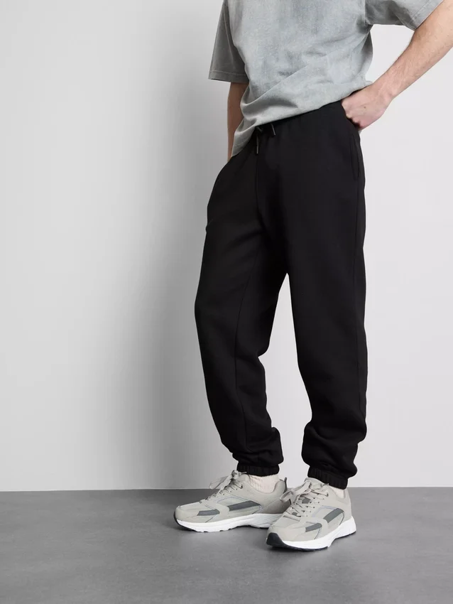 Joggingbukser med elastisk talje og manchetter