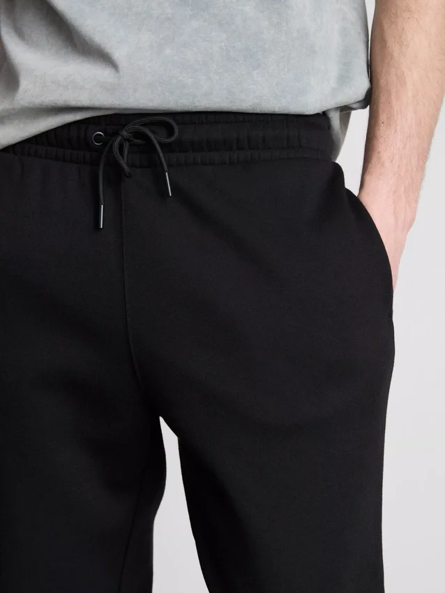 Joggingbukser med elastisk talje og manchetter
