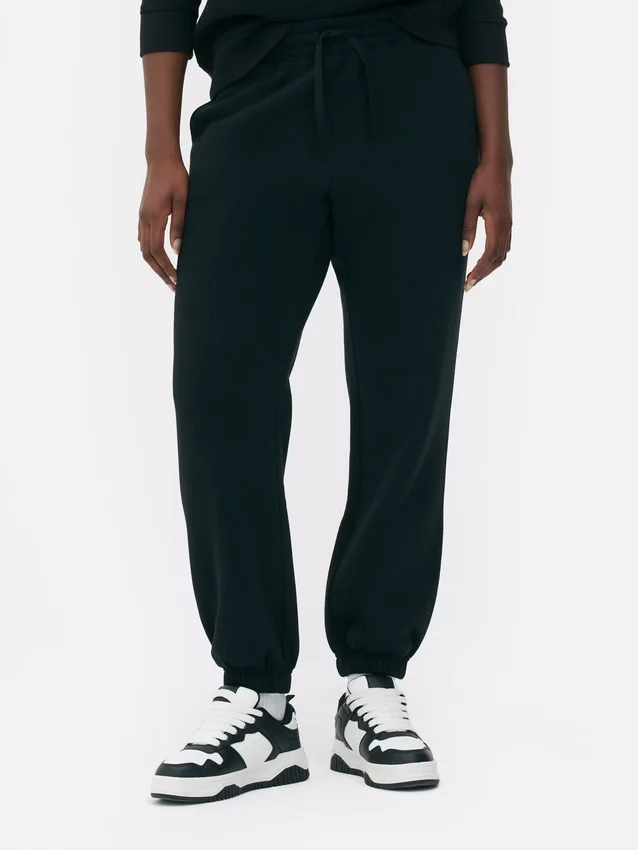 Joggingbukser med manchetter og snøre i benene