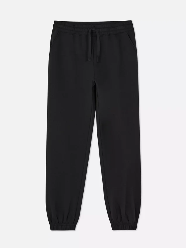 Joggingbukser med manchetter og snøre i benene