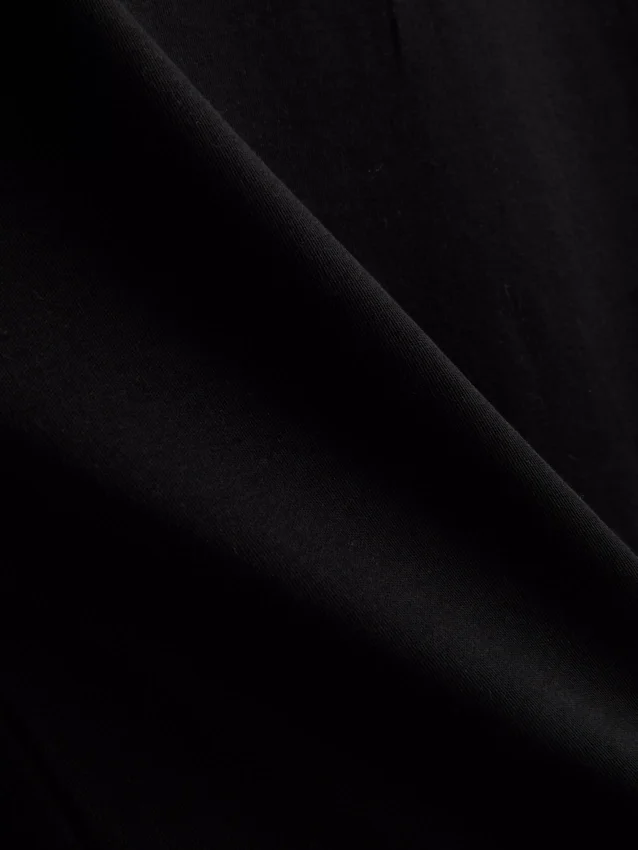 Kort, ærmeløs T-shirt med skulderpuder