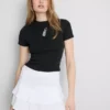 Kort baby-T-shirt med perler, med højt bomuldsindhold