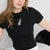 Kort baby-T-shirt med perler, med højt bomuldsindhold