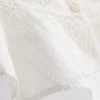 Kort cropped cami-top i bomuld med udskæringer