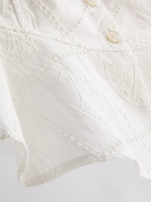 Kort cropped cami-top i bomuld med udskæringer