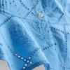 Kort cropped cami-top i bomuld med udskæringer
