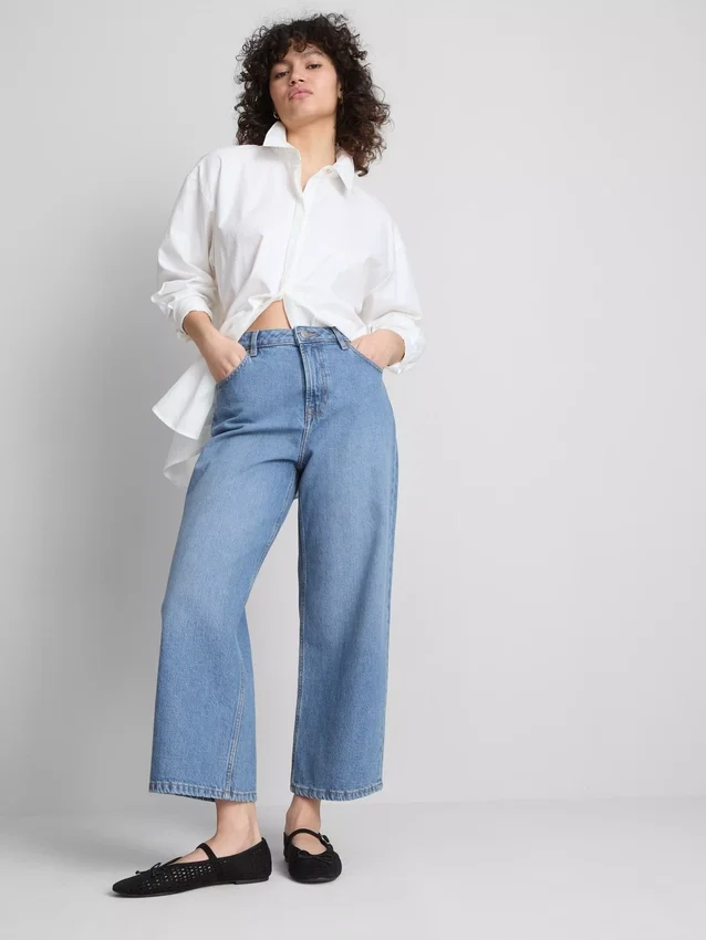 Korte jeans i denim med brede ben