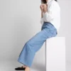 Korte jeans i denim med brede ben