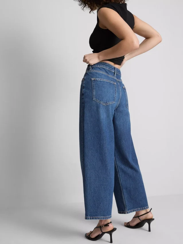 Korte jeans i denim med brede ben