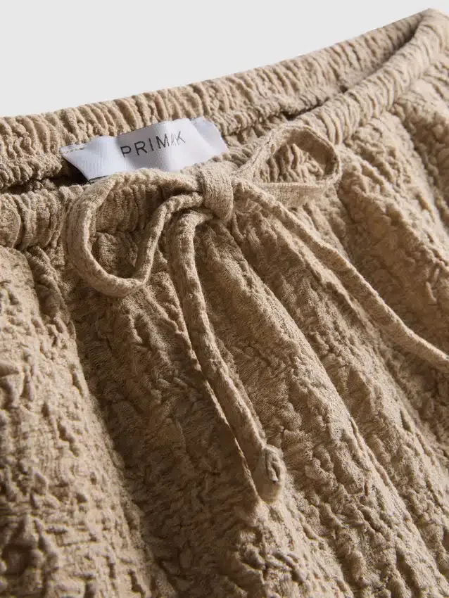 Krøllede shorts med snøre