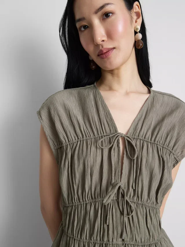 Krøllet top med bindebånd foran