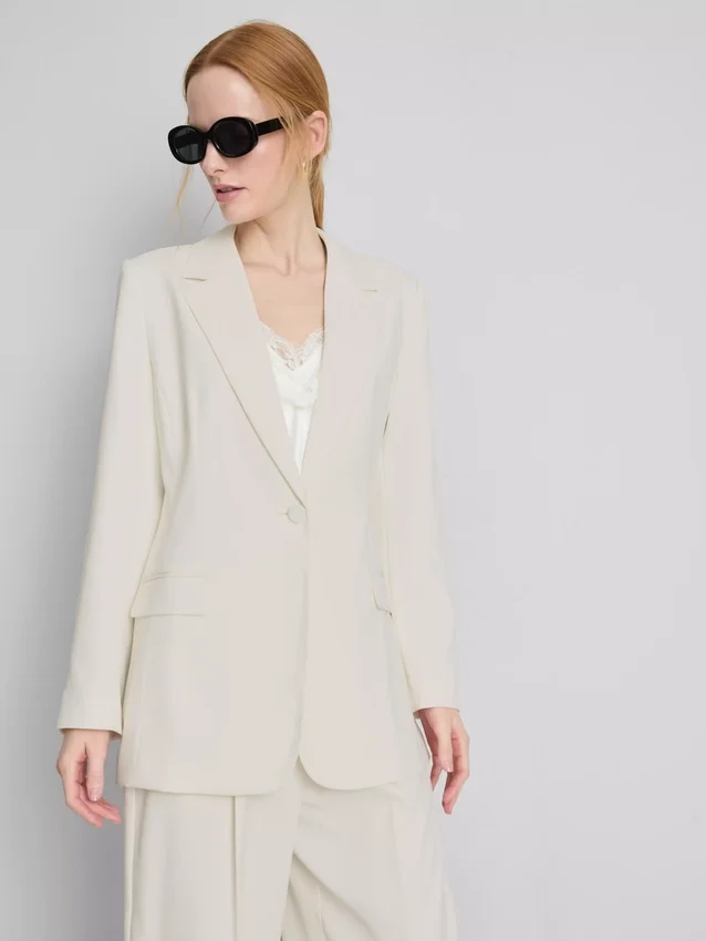 Lila blazer med enkelt række knapper