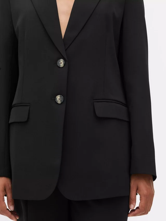 Lila blazer med enkelt række knapper