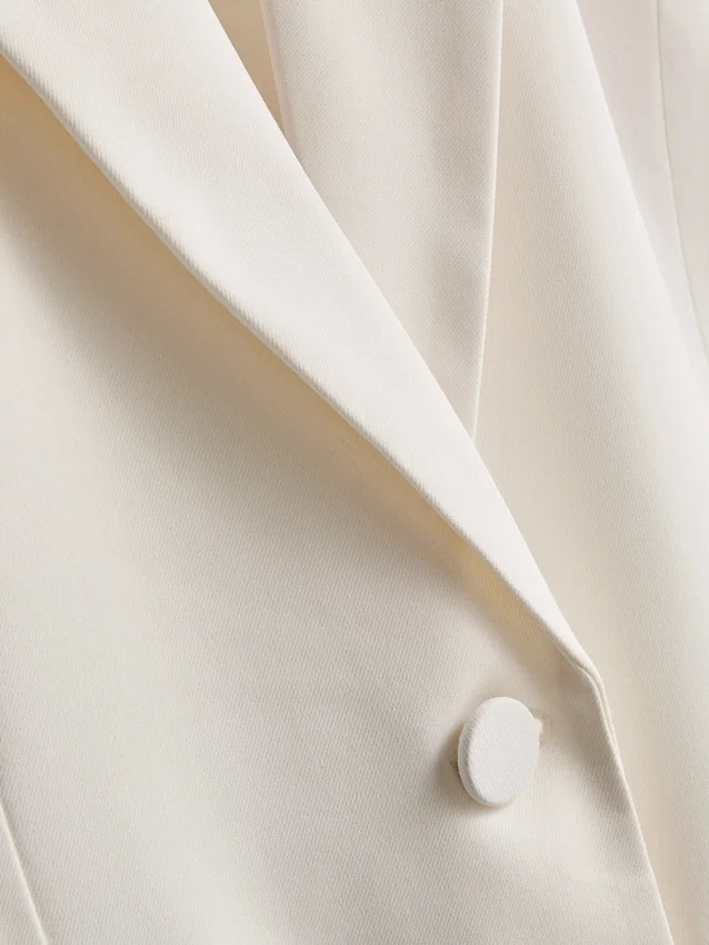 Lila blazer med enkelt række knapper