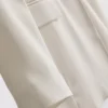 Lila blazer med enkelt række knapper