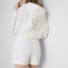 Løse shorts med blomsterprint i bomuldsblanding