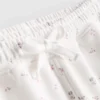 Løse shorts med blomsterprint i bomuldsblanding