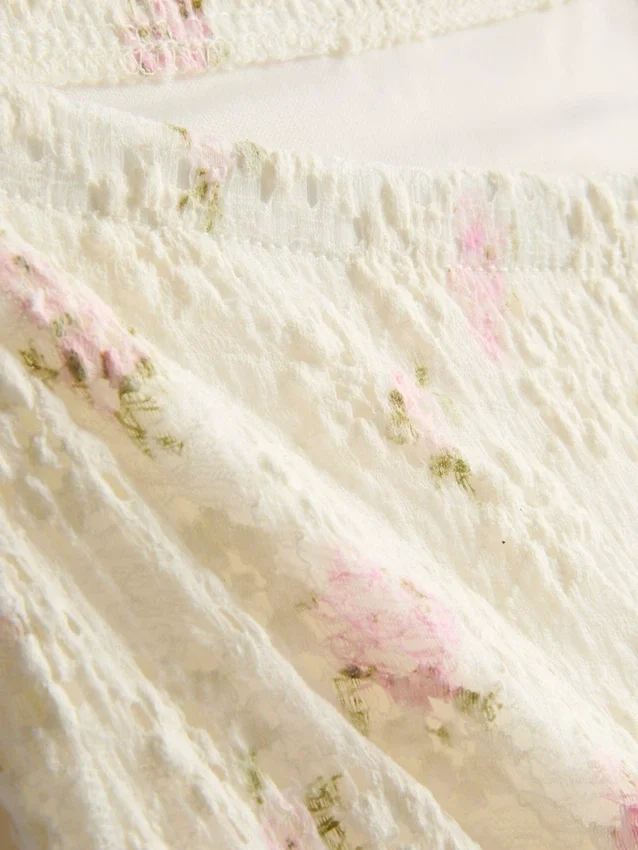 Midi-nederdel i bomuldsblanding med struktur og blomsterprint