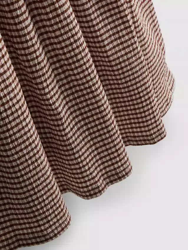 Mini-kjole med struktur og krøllet look