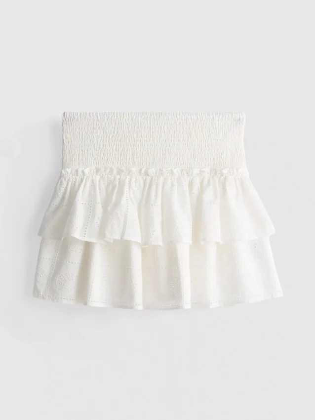 Mini-nederdel i bomuld med lag-på-lag-design og broderi