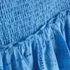 Mini-nederdel i bomuld med lag-på-lag-design og broderi