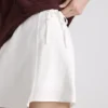 Mini-skort i linneblanding med bindebånd i siden