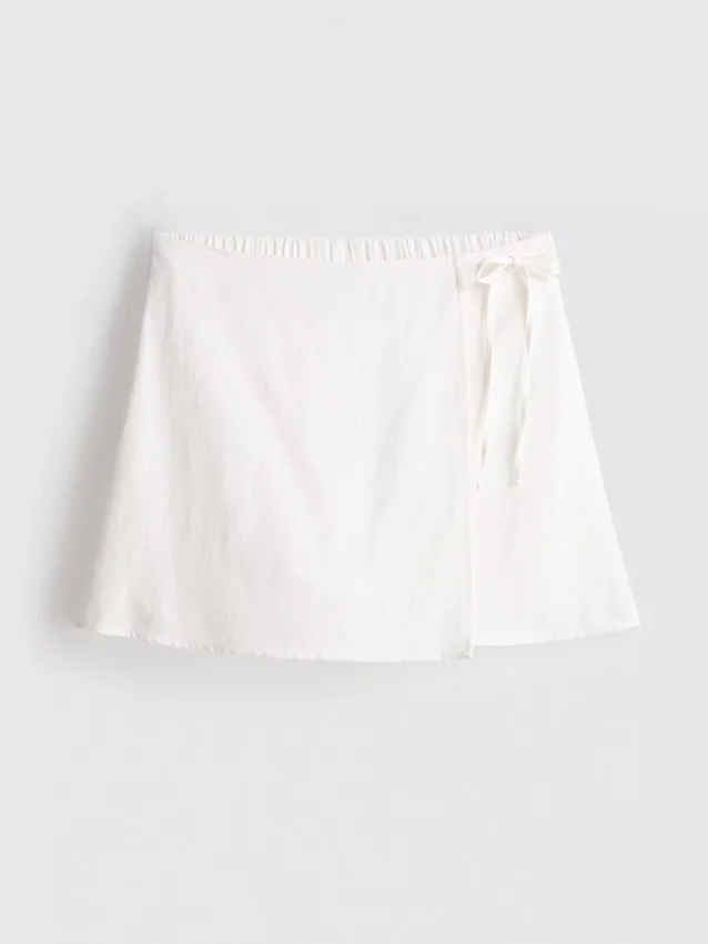 Mini-skort i linneblanding med bindebånd i siden