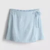 Mini-skort i linneblanding med bindebånd i siden