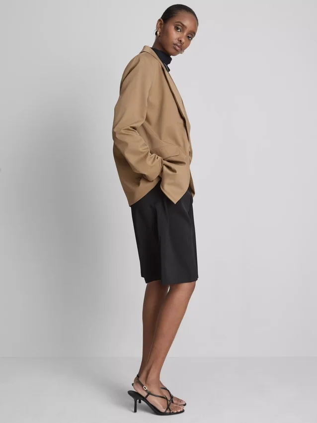Oversized blazer med enkeltradet knaplukning