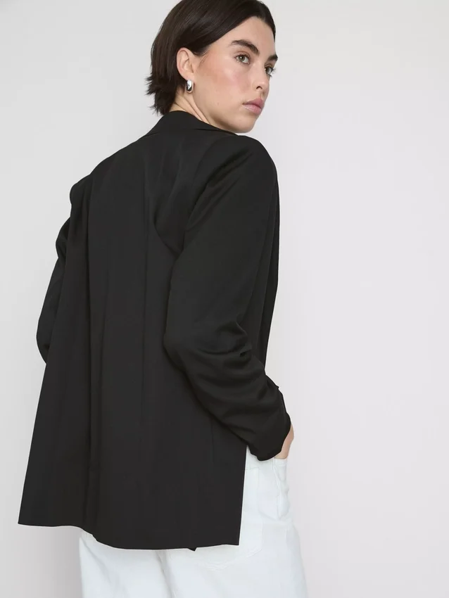 Oversized blazer med enkeltradet knaplukning