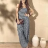 Paula Echevarría bandeau-top i gingham med flæser