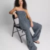 Paula Echevarría bandeau-top i gingham med flæser